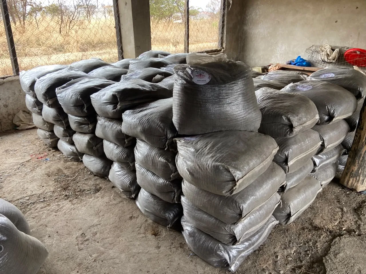 Real packed Happy Roots inventory stacked and ready in Zambia
